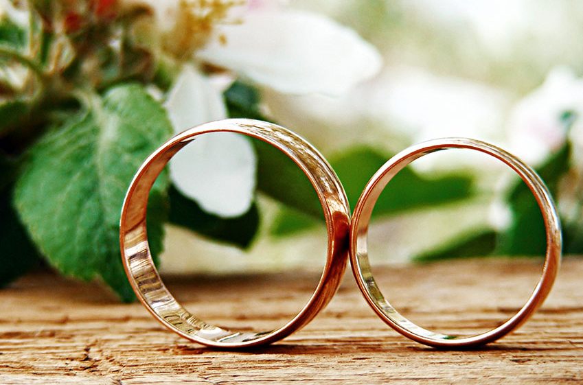 Two rings sit on a table